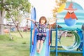 Beautiful smiling cute girl on a playground Royalty Free Stock Photo