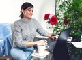 Beautiful Smiling Freelance Woman with Laptop Working