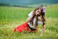 Beautiful smiling girl on cereal field in spring Royalty Free Stock Photo