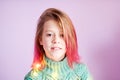 Beautiful smiling girl with pink hair posing for fashion shoot Royalty Free Stock Photo