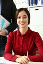 Beautiful smiling girl at workplace look in camera portrait Royalty Free Stock Photo