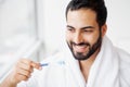 Beautiful Smiling Man Brushing Healthy White Teeth With Brush. H Royalty Free Stock Photo