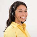 Beautiful smiling receptionist on the telephone Royalty Free Stock Photo