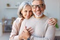 Beautiful smiling senior family couple husband and wife looking at camera with love Royalty Free Stock Photo