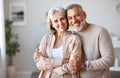 Beautiful smiling senior family couple husband and wife looking at camera with love Royalty Free Stock Photo