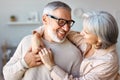 Beautiful smiling senior family couple husband and wife looking at each other with love Royalty Free Stock Photo