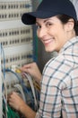 beautiful smiling technician analysing server Royalty Free Stock Photo