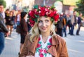 Beautiful smiling Ukrainian woman wearing flower wreath