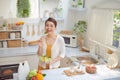 Beautiful Smiling Woman Eating Fresh Organic Vegetarian Salad In Modern Kitchen Royalty Free Stock Photo