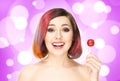 Beautiful smiling woman with a lollipop on bubble background Royalty Free Stock Photo