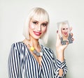 Beautiful smiling woman showing selfie photo on smart phone Royalty Free Stock Photo