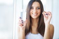 Beautiful Smiling Woman Taking Vitamin Pill. Dietary Supplement Royalty Free Stock Photo