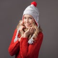 Beautiful smiling woman wearing winter clothing. Royalty Free Stock Photo