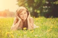 Beautiful smiling woman Woman listening to music on headphones o Royalty Free Stock Photo