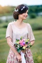 Beautiful smiling young woman enjoys a summer day. Creative hairstyle with butterflies in your hair Royalty Free Stock Photo