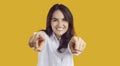 Beautiful smiling young woman pointing with two fingers to camera and saying I choose you. Royalty Free Stock Photo