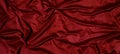 Beautiful smooth elegant wavy red satin silk luxury cloth fabric texture, abstract background design pattern, top view Royalty Free Stock Photo