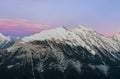 Beautiful snow capped mountains against the twilight sky at Banff National Park in Alberta, Canada Royalty Free Stock Photo