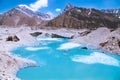 Beautiful snow-capped mountains with lake against the blue sky. Himalaya, Nepal Royalty Free Stock Photo