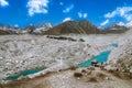 Beautiful snow-capped mountains with lake against the blue sky. Himalaya, Nepal Royalty Free Stock Photo