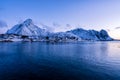 The epic snow covered mountains of the Lofoten Islands. Reine, Norway