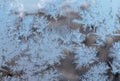 Beautiful snow patterns, water ornaments on transparent glass.Christmas snowflakes.