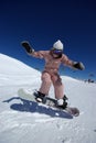 Beautiful snowboarder jumping Royalty Free Stock Photo