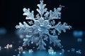 Beautiful snowflake on dark background with drops, winter postcard, highlights. Royalty Free Stock Photo