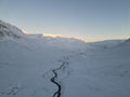 Beautiful snowy landscape with white glaciers and deep blue cracks in Iceland