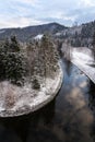 Beautiful snowy winter forest landscape, Tepla River under Brezova dam Royalty Free Stock Photo