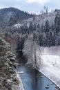 Beautiful snowy winter forest landscape, Tepla River under Brezova dam Royalty Free Stock Photo