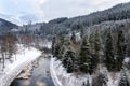 Beautiful snowy winter forest landscape, Tepla River under Brezova dam Royalty Free Stock Photo