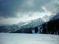 Beautiful snowy winter landscape in a mountain ski resort, panoramic view Royalty Free Stock Photo