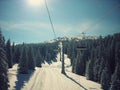 Beautiful snowy winter landscape in a mountain ski resort, retro style Royalty Free Stock Photo