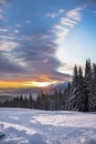 Beautiful snowy winter mountains with amazing color skyline