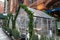 Socially Distant Outdoor Dining Greenhouses at a Restaurant during the Winter and Covid 19 Pandemic in NoHo of New York City