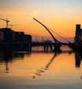 Beautiful soft sunset over the Dublin city with a bridge over the river