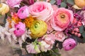 Beautiful soft wedding pink yellow bouquet with roses flowers close up. Floral background Royalty Free Stock Photo