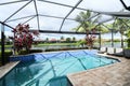 Beautiful South Florida retirement home with luxurious pool and screened in patio. Royalty Free Stock Photo