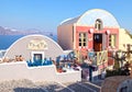 Beautiful souvenir shops on colorful narrow street , Oia, Santor Royalty Free Stock Photo