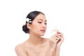 Beautiful spa Asian model girl holding plumeria flowers with make up and beauty healthy skin color lips red and hair portrait. Royalty Free Stock Photo