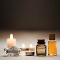 Beautiful spa composition with candles, oil flasks and bowl with salt. Pleasant beige and brown background. Copy space.