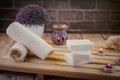 Beautiful spa composition with natural soaps with scented candles and bathroom accessories in a romantic setting for a cleansing Royalty Free Stock Photo