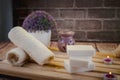 Beautiful spa composition with natural soaps with scented candles and bathroom accessories in a romantic setting for a cleansing Royalty Free Stock Photo