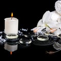 Beautiful spa concept of delicate white hibiscus, zen stones wit Royalty Free Stock Photo