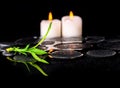 Beautiful spa still life of green twig bamboo and candles on zen Royalty Free Stock Photo