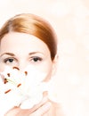 Beautiful spa woman with lilly Royalty Free Stock Photo