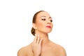 Beautiful spa woman touching her neck. Royalty Free Stock Photo