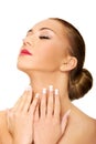 Beautiful spa woman touching her neck. Royalty Free Stock Photo