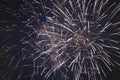 Beautiful sparkling fireworks, white, with haze, in the night sky Royalty Free Stock Photo